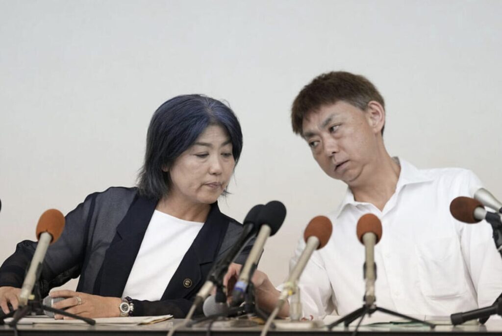 福島弁護士と田久保市長の写真